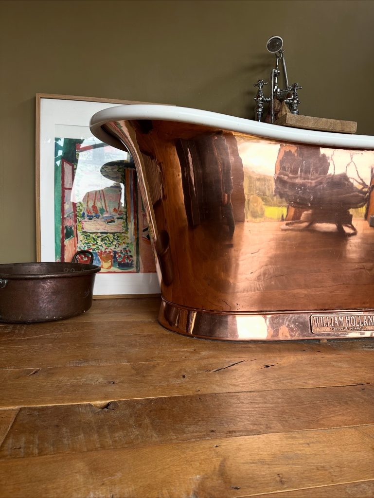 copper bath wood floor